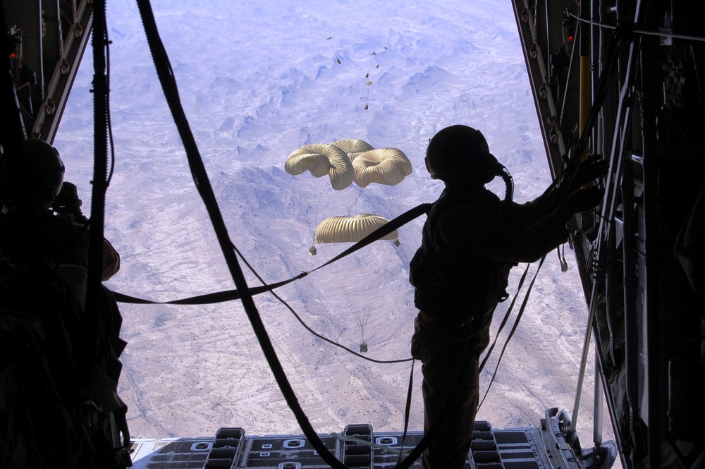 A U.S Air Force loadmaster secures the ramp of a C-130 Hercules.