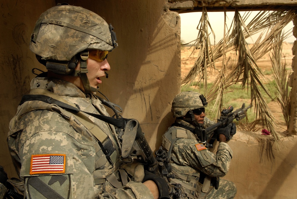Staff Sgt. Richard Wilson (left) maintains communications.