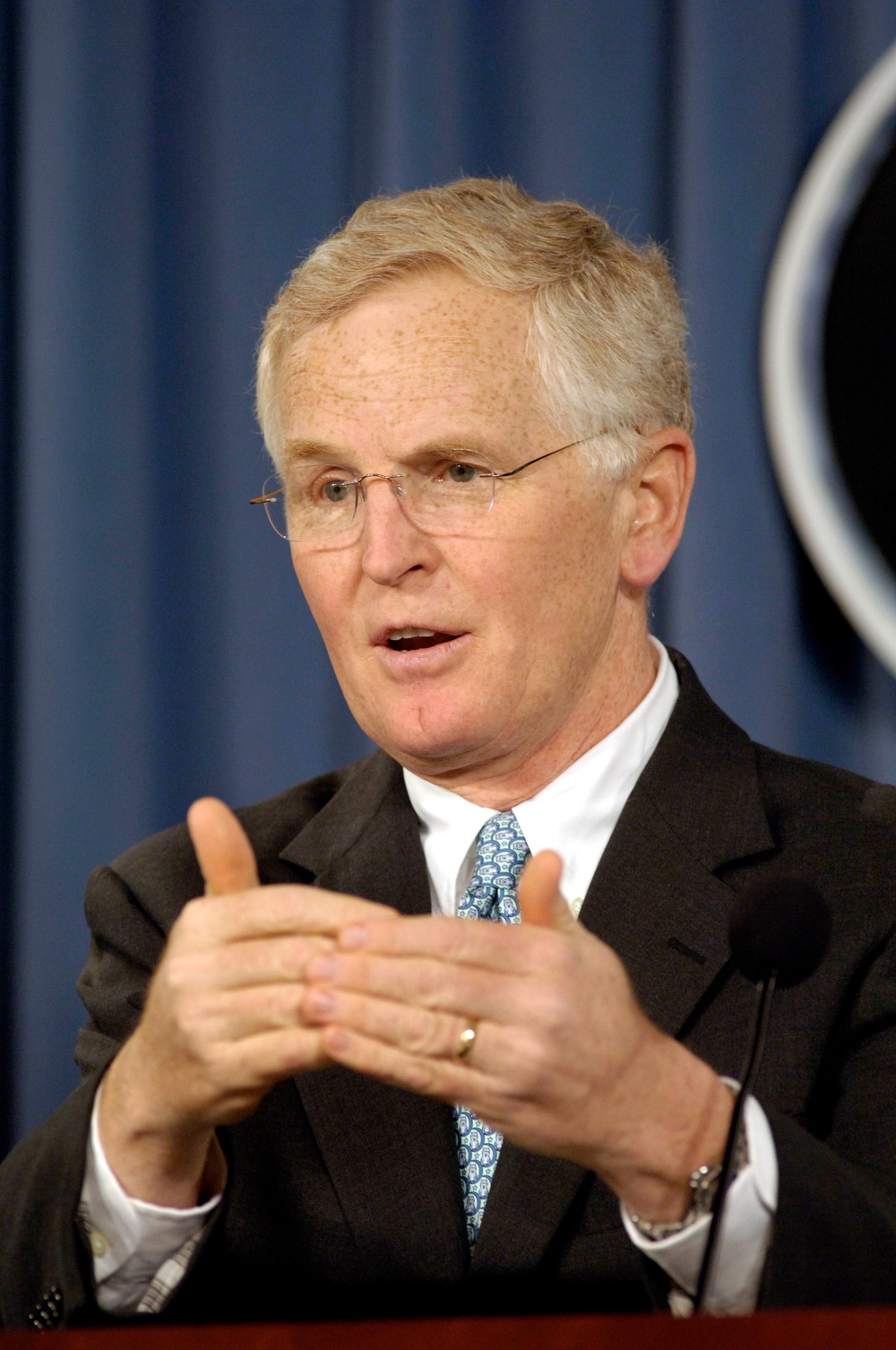 Dr. S. Ward Casscells makes opening remarks at a press conference.