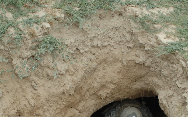 U.S. Army Spc. William Fowler enters a cave.