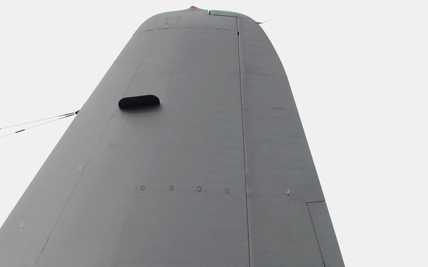 Senior Airman Christopher Alfonso removes the gust locks.