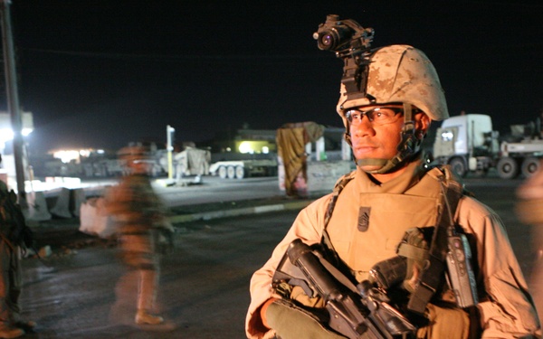 A U.S. Marine provides security for fellow Marines.