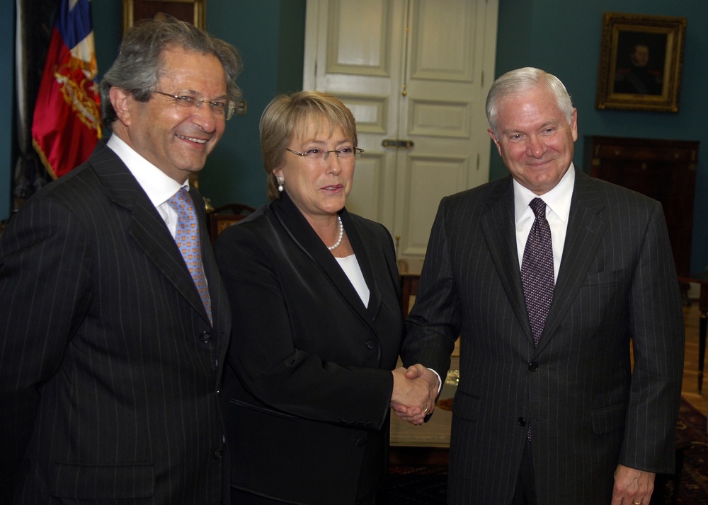 Chilean President Michelle Bachelet greets Secretary Gates.