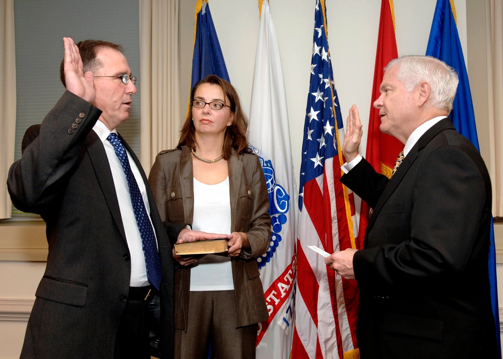 Michael G. Vickers takes the oath of office.