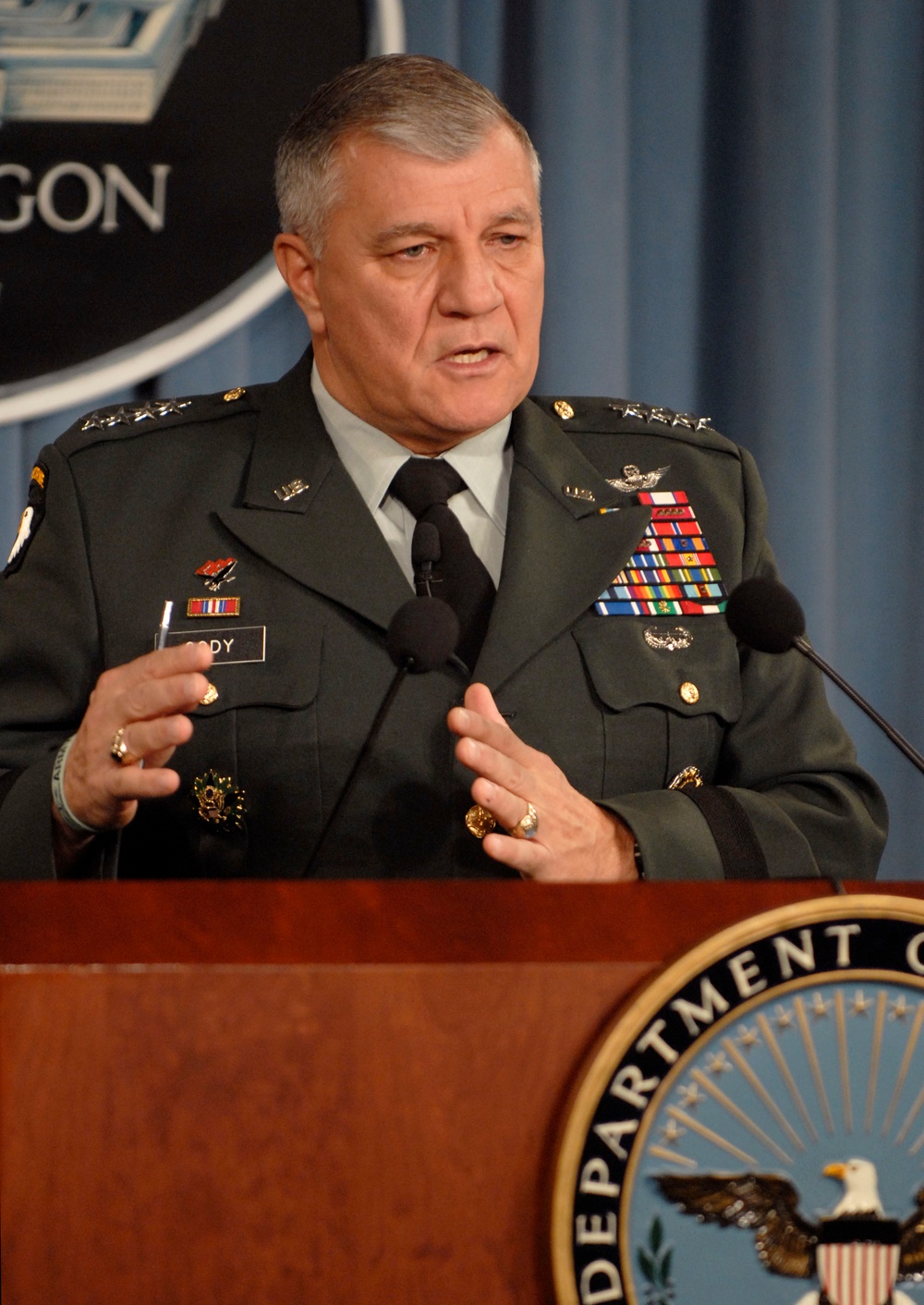Gen. Richard Cody conducts a press briefing.