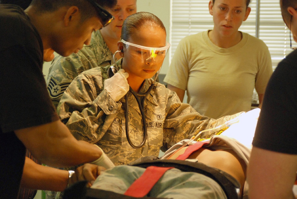 U.S. Air Force 1st Lt. Jasmin Furlough stabilizes a patient.