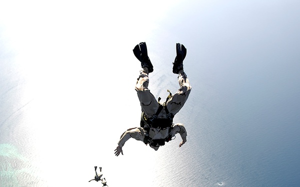 U.S. Air Force pararescuemen conduct a pararescue training jump.