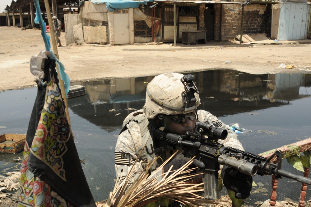 Spc. Marcus Wright maintains a fighting position.