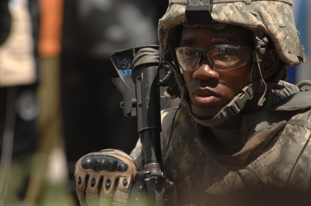 Sgt. Dajuan Turner provides security outside a school.