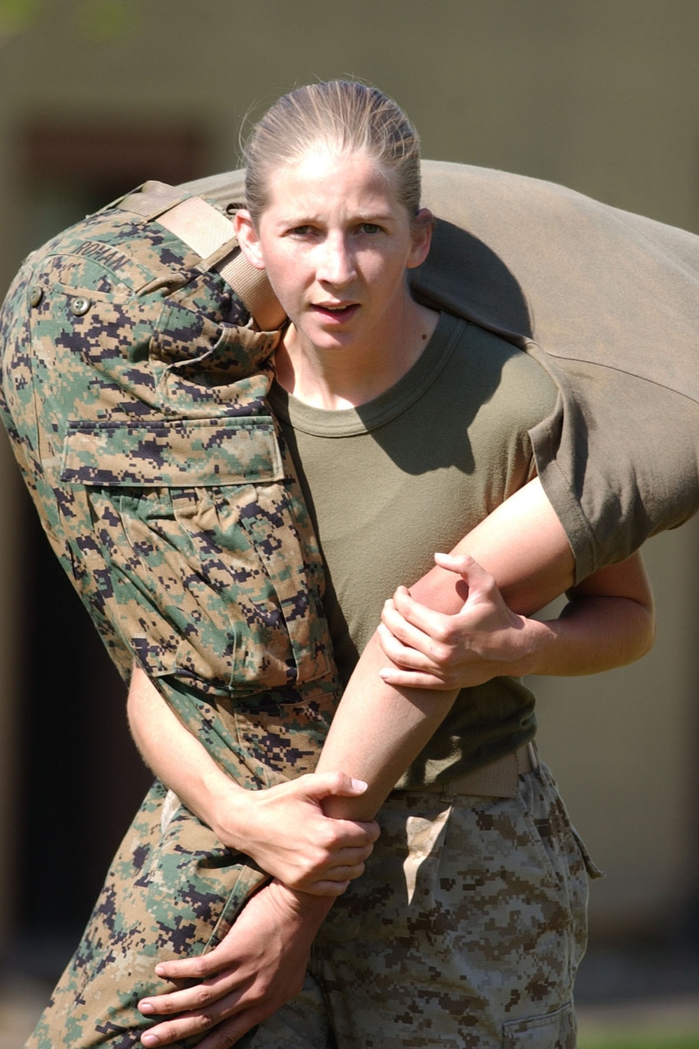 Cpl. Jennifer Eagelman performs the fireman's carry.