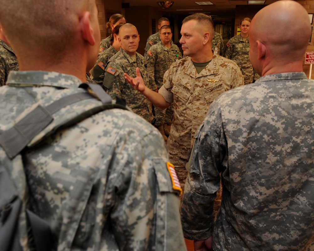 Gen. James E. Cartwright speaks with U.S. service members.