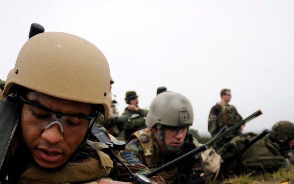 Staff Sgt. Peter Davey and Tech. Sgt. James Godlew provide grid coordinates.