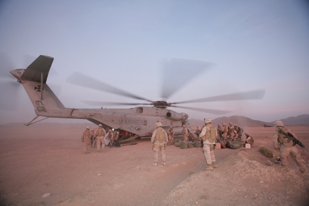 U.S. Marines unload a CH-53E Super Stallion helicopter.