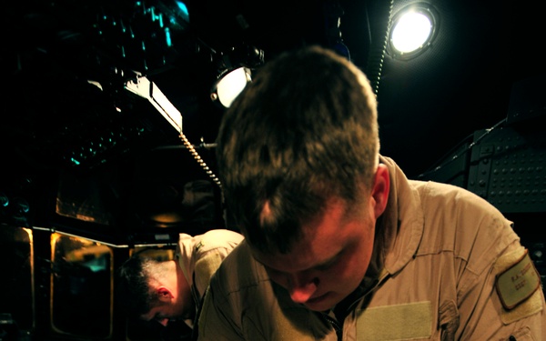 Staff Sgt. Ray Scheindel completes a post-flight checklist.