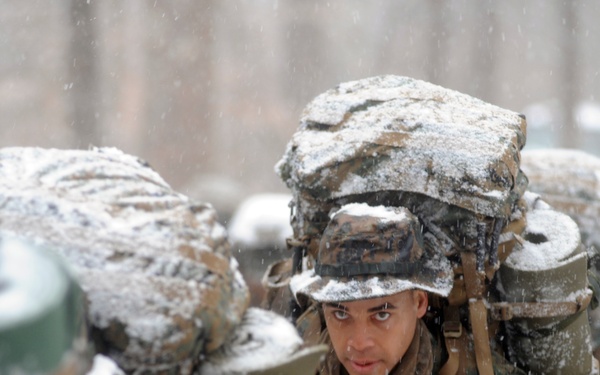 U.S. Marine Corps officer candidates brave winter weather conditions.