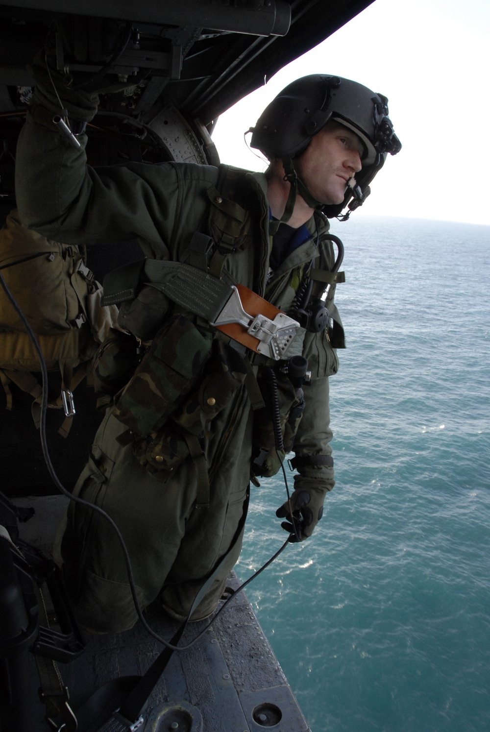 Staff Sgt. Joseph Kenney observes his surroundings for flight safety.