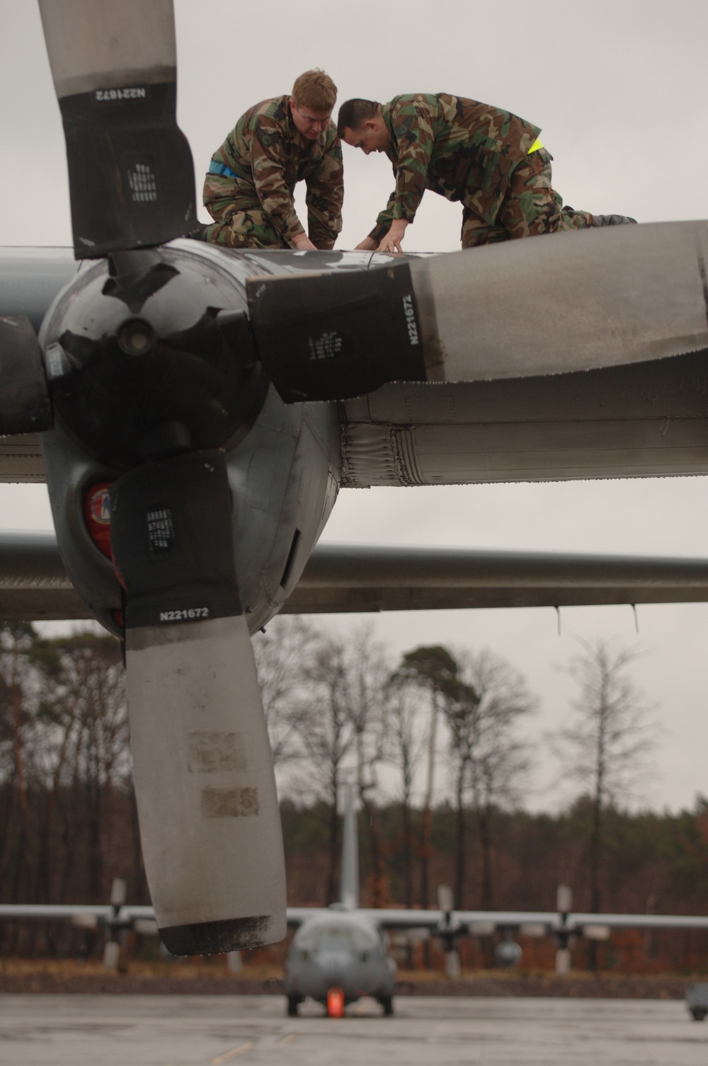 Staff Sgts. Paul Harris and Devon Bullock conduct preventative maintenance inspections.