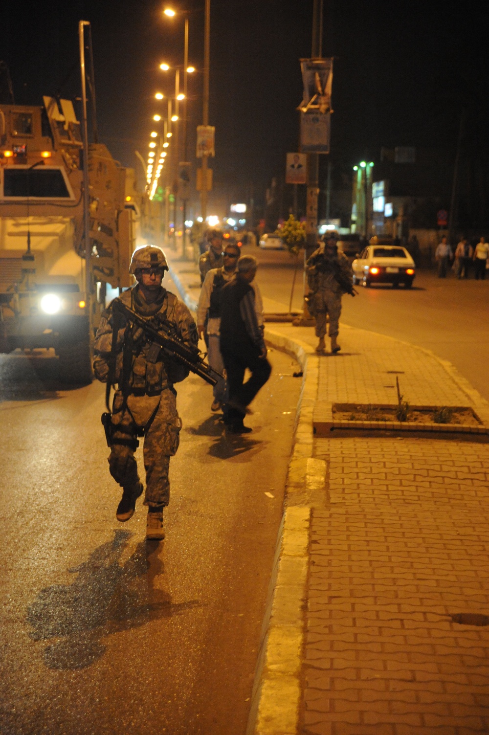 Staff Sgt. Anthony Grey patrols the street.