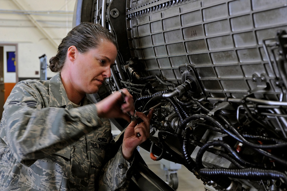Senior Airman Deanna Neuharth performs a final inspection.