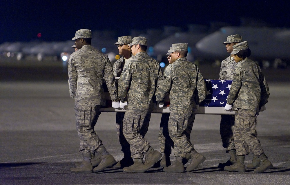 U.S. Air Force airmen transfer the remains of Air Force Staff Sgt. Phillip A. Myers.