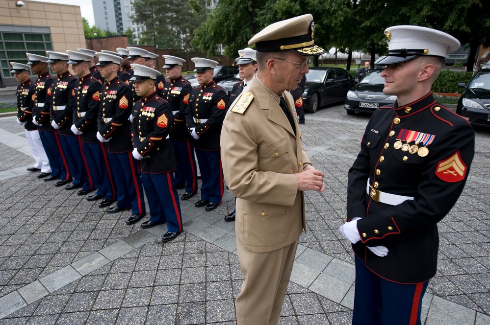 Adm. Mike Mullen speaks with a Marine assigned to the U.S. Embassy in Moscow.