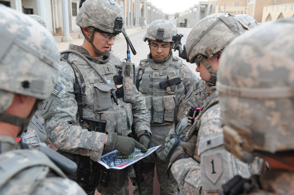 U.S. Army 1st Lt. Seth Sanert goes over the scheme of maneuver with his troops.