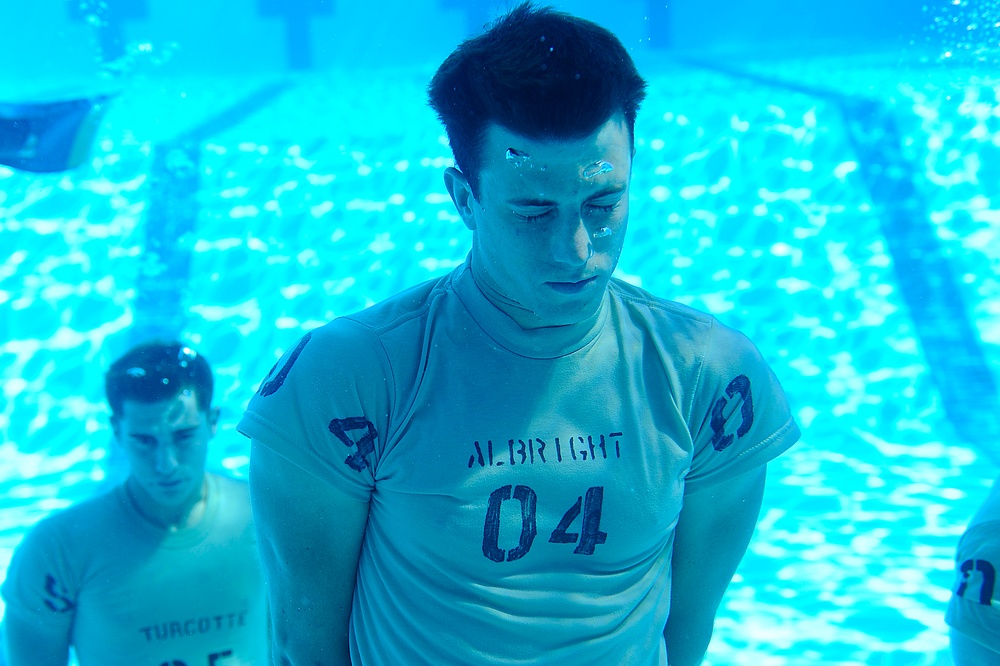Special Tactics Training Squadron students practice drown-proofing.