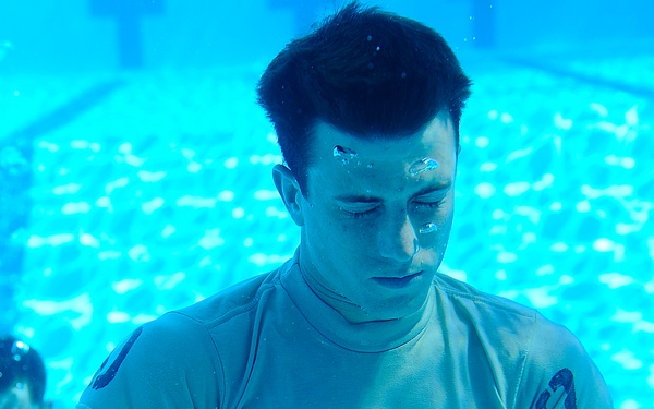 Special Tactics Training Squadron students practice drown-proofing.