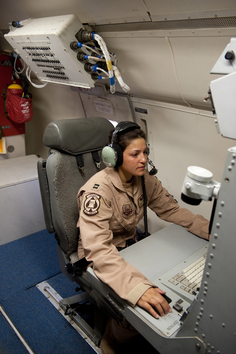 Capt. Dana Arrieta manages the radar aboard an E-8 Joint Surveillance Target Attack Radar System aircraft.