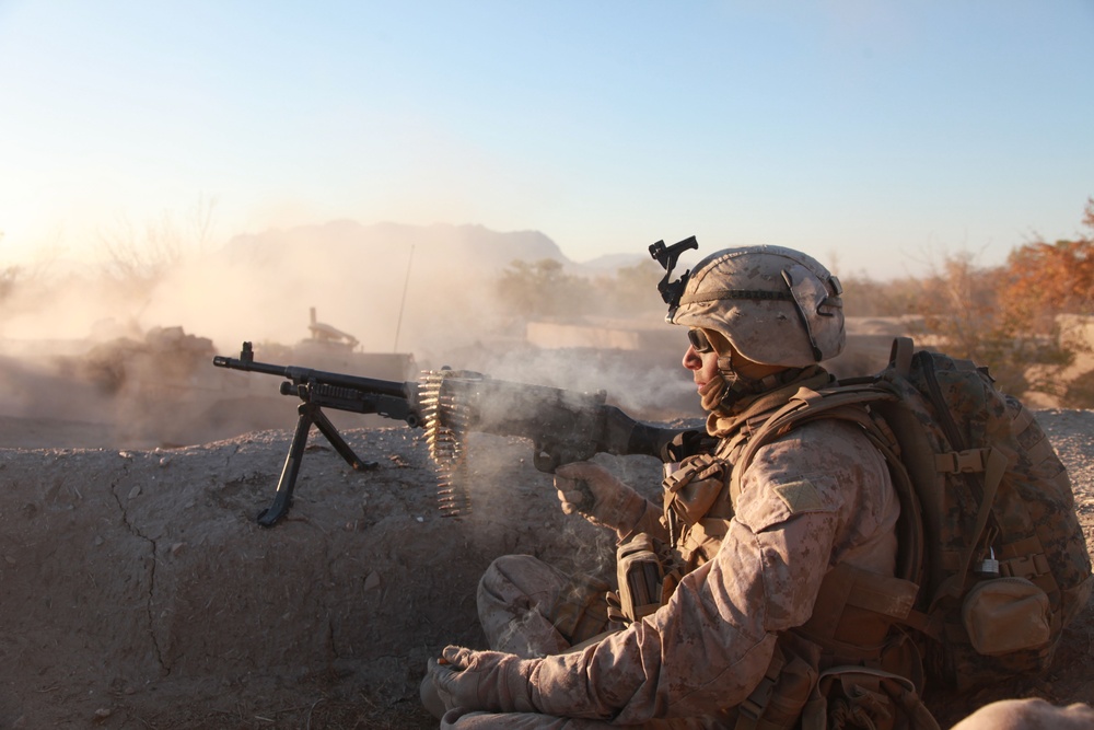 A U.S. Marine provides support by fire during Operation Cobra's Anger.