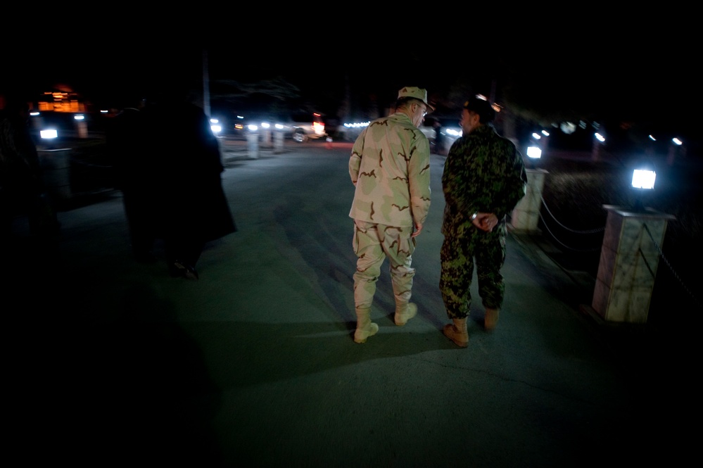 Adm. Mike Mullen and Afghan Chief of Defense Gen. Bismillah Khan depart the Afghan Presidential Palace. Adm. Mike Mullen and Afghan Chief of Defense Gen. Bismillah Khan depart the Afghan Presidential Palace.