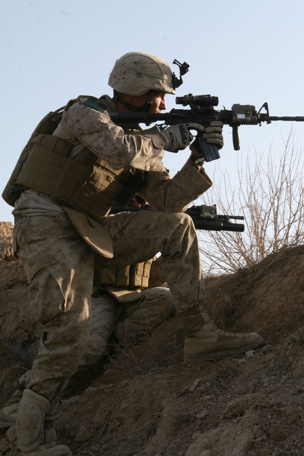 DVIDS - Images - U.S. Marines take cover behind a berm after receiving ...