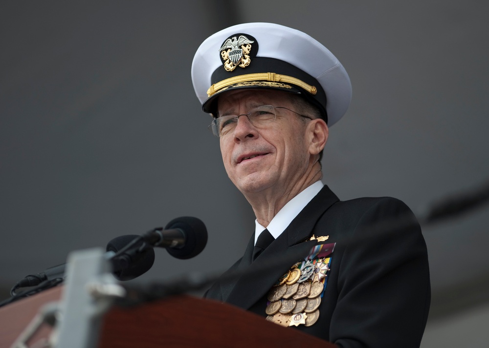 Adm. Mike Mullen addresses the audience at a commissioning ceremony.