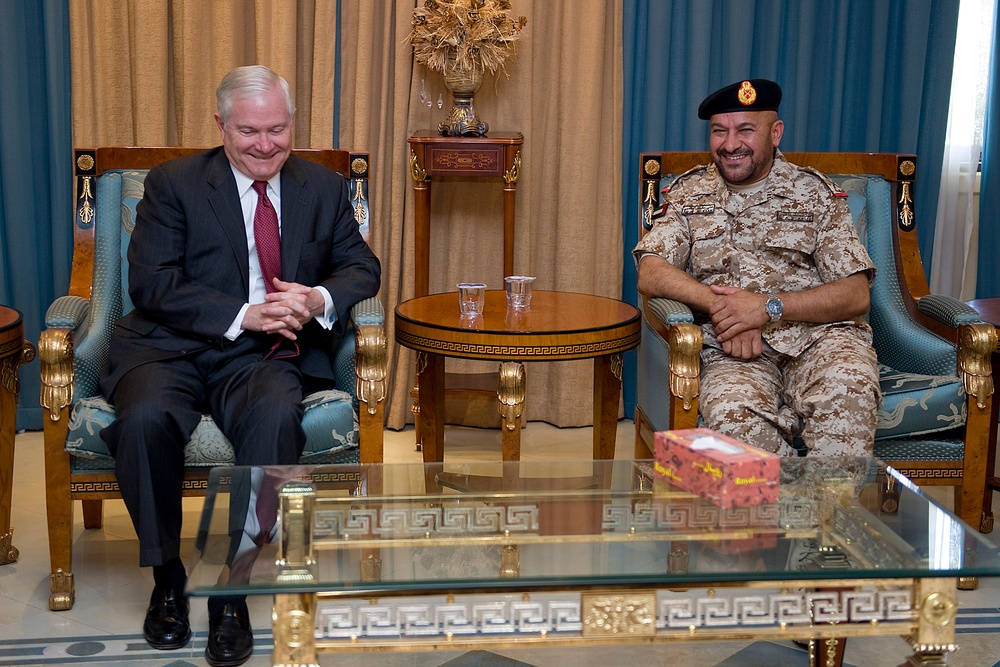 Secretary Gates shares a laugh with Deputy Chief of Staff Maj. Gen. Ali Al Kaabi.