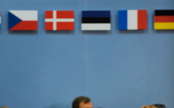 Secretary Gates listens to the opening remarks of the North Atlantic Treaty Organization Defense Ministerial.