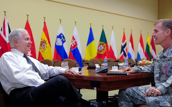 Secretary Gates talks with Commander of International Security Assistance Force-Afghanistan Gen. Stanley McChrystal.