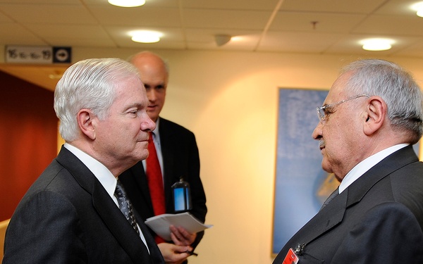 Secretary Gates talks with Turkish Defense Minister Mehmet Vecdi Gonul.