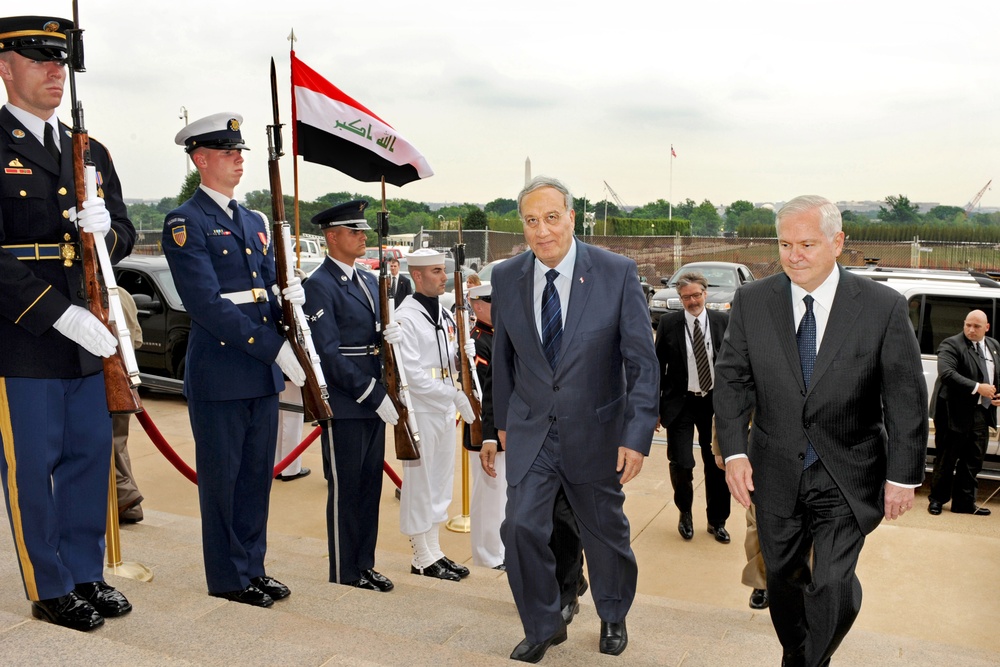 Secretary Gates escorts Iraqi Minister of Defense Abdul Qader into the Pentagon.