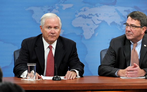 Secretary Gates and Ashton Carter conduct a joint Pentagon press briefing.