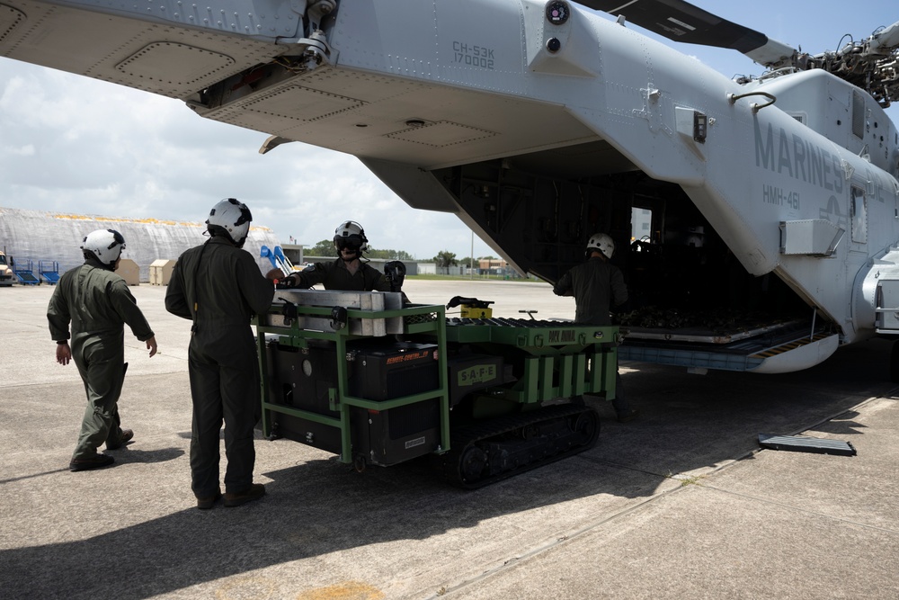 U.S. Marines with HMH-461 load equipment onto a CH-53K King Stallion