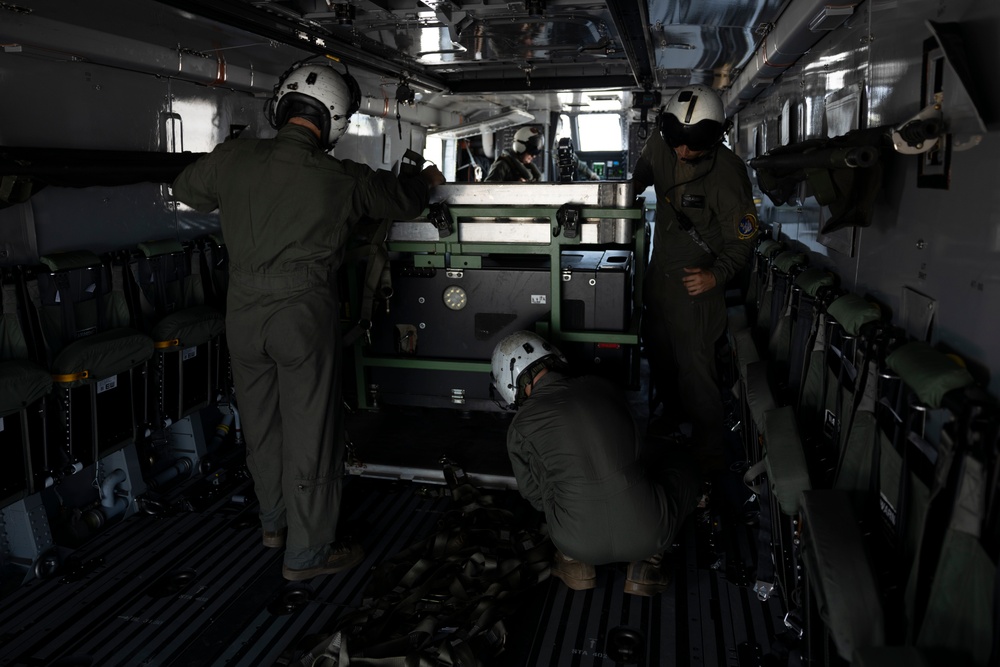 U.S. Marines with HMH-461 load a utility vehicle onto a CH-53K King Stallion