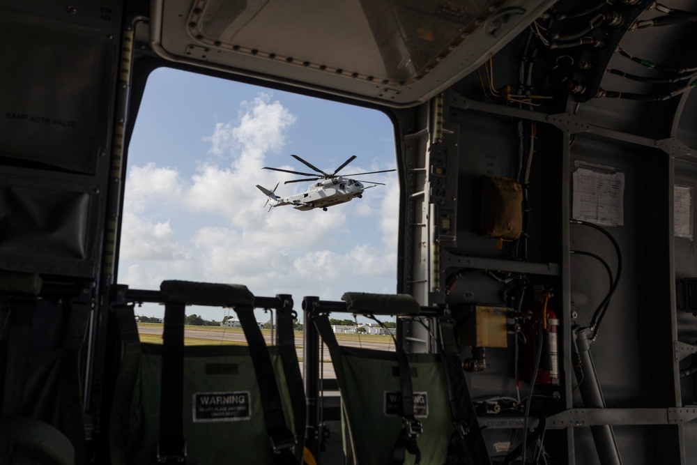 U.S. Marines with HMH-461 load a M274 utility vehicle onto a CH-53K King Stallion