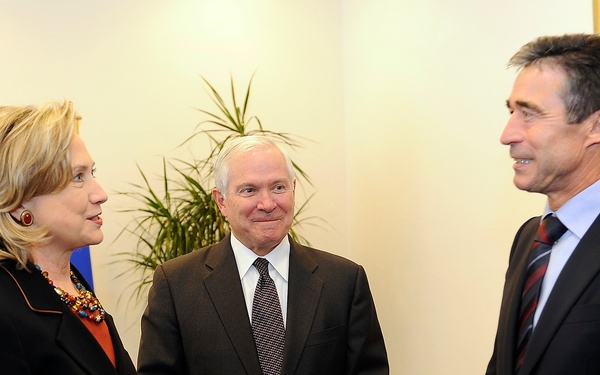 Secretary of State Hilary Clinton, Secretary Gates and NATO Secretary General Anders Fogh Rasmussen meet together at NATO headquarters.