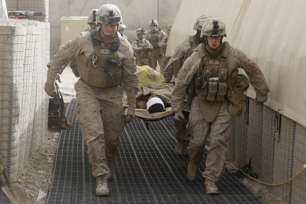 U.S. Marines prepare to medically evacuate an Afghan National Army soldier.
