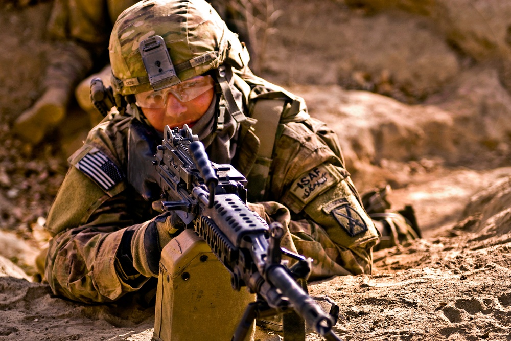 Spc. Paul M. Cattorn provides security for Afghan National Security Forces. Spc. Paul M. Cattorn provides security for Afghan National Security Forces.