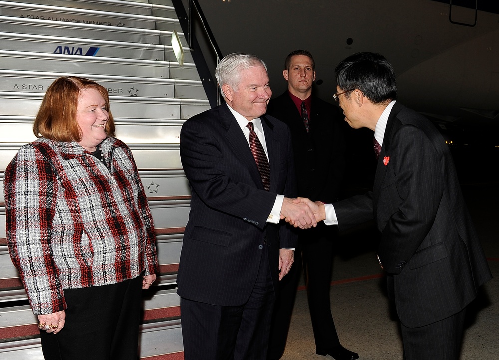 Secretary Gates and wife Becky are greeted by the Director General of the Japanese Ministry of Foreign Affairs Umemoto.