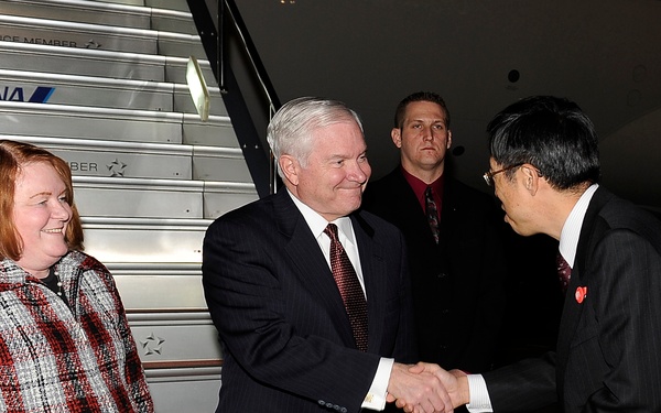 Secretary Gates and wife Becky are greeted by the Director General of the Japanese Ministry of Foreign Affairs Umemoto.