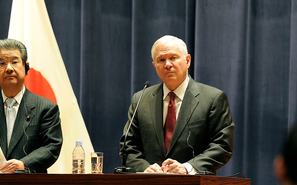 Secretary Gates and Japanese Defense Minister Kitazawa Toshimi listen to a reporter's question.
