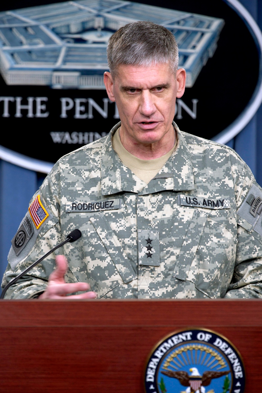 Lt. Gen. David M. Rodriguez speaks with members of the press.