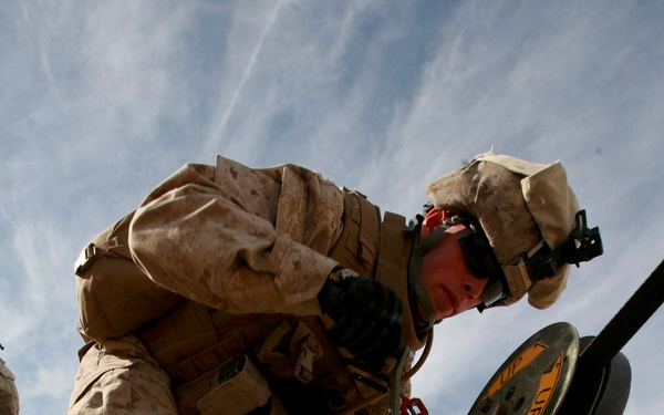 Lance Cpl. Joseph J. Gefhard sets up an antenna during Mojave Viper.